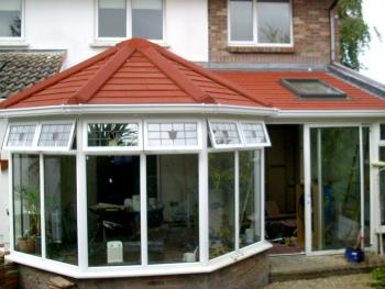 A solid conservatory roof, which replaced a traditional glass roof